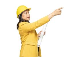 Engineer holding yellow helmet with blueprint isolated on white background with clipping path photo