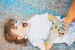 Little girl dirty of paint photo