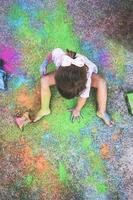 Little girl dirty of paint photo