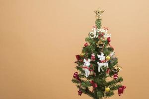 Christmas tree on autumn background photo