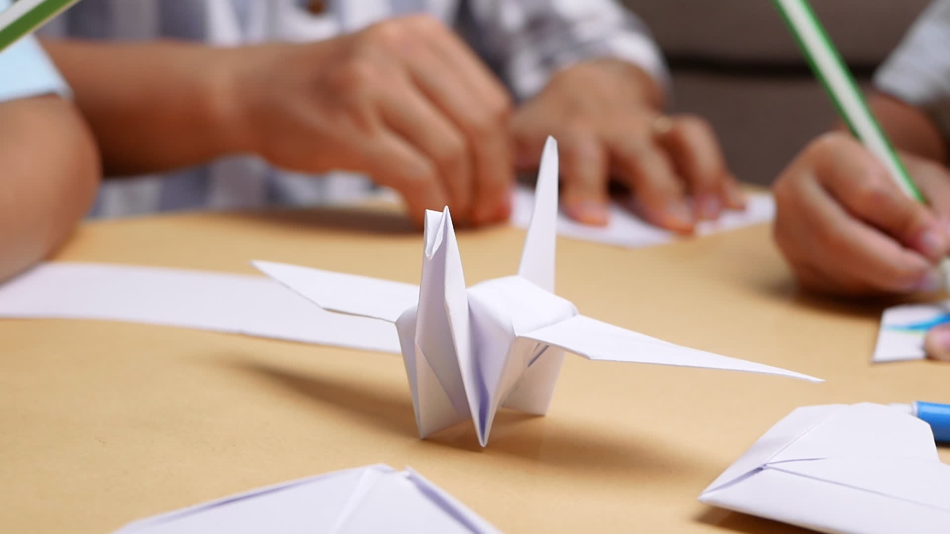 Close up of Mother and daughter learning about The Japanese art of