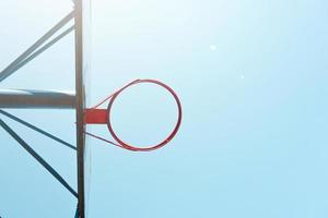 street basketball hoop and blue sky photo