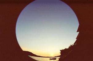 Boats at sunset photo