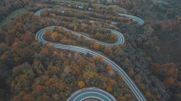 Aerial view of curved road on southern Poland mountains during autumn photo