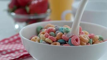 Milk pouring into bowl of cereal in slow motion shot on Phantom Flex 4K at 1000 fps video