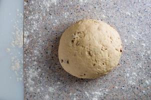 Homemade dough, semisweet dough with raisins, honey and  various seeds photo