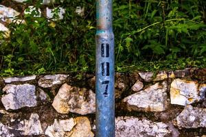 Pole with numbers on it photo