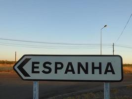 Traffic signal indicating towards Spain photo