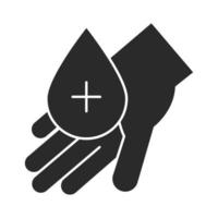 Mano con gota de sangre, donación de caridad médica y amor silueta icono vector