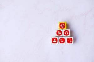 Wood cube box and business icons on white background for marketing plan and business concept photo