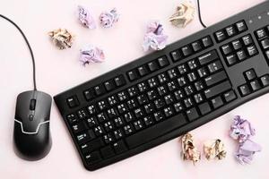 Keyboard with money on white background and top view working space photo