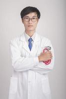 Medicine doctor hand holding stethoscope and working photo