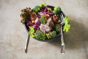 Salad on wood table ,Healthy food concept photo