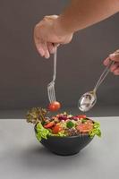 Salad on wood table ,Healthy food concept photo