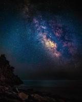 Milky way over the seashore photo