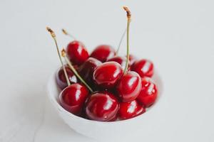 Fresh cherries. Cherry on white background. Healthy food concept. photo