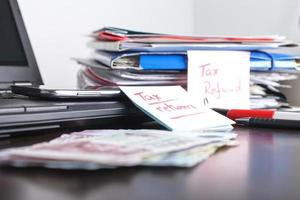 Tax refund paperwork, financial status , photo