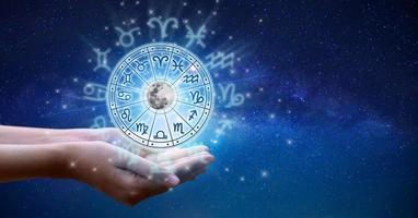 Zodiac signs inside of horoscope circle. Astrology in the sky with many stars and moons  astrology and horoscopes concept photo