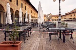 Tables and chairs in an outdoor restaurant in Vigevano