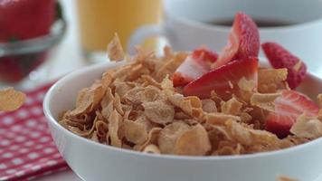 Strawberries falling into cereal in slow motion shot on Phantom Flex 4K at 1000 fps video