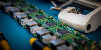 Circuit boards on table photo