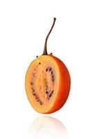 Half of Tamarillo fruit, slice, isolated on white background with drop shadow. photo