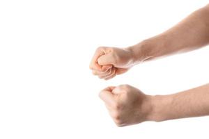 Man keep fingers crossed, hand gesture. Isolated on white background. photo