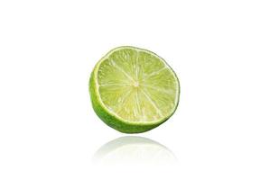 Piece of lime, slice, isolated on white background with drop shadow. photo