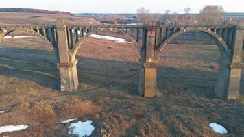 old historic railway bridge aerial shot from quadrocopter