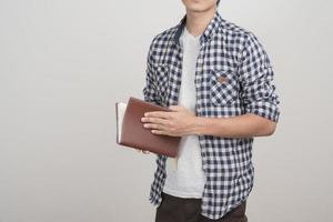 Close up of boy with a book photo