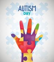 world autism day and hand with puzzle pieces vector