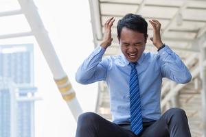 Businessman stressed with work photo