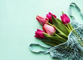 Spring tulips in eco bag photo