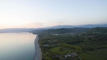 Aerial view of the seascape at sunset photo