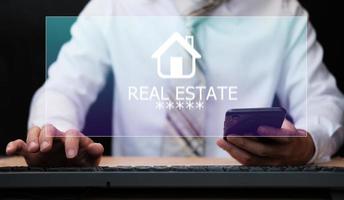 Businessman buy house, real estate concept photo