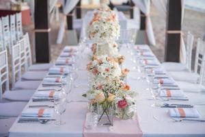 The elegant dinner table on the beach photo