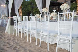 The elegant dinner table on the beach photo