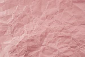 Crumpled Rose paper with soft texture. Simple background. photo