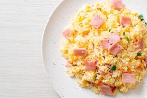 Homemade fried rice with ham on plate photo