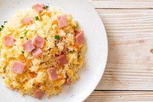 Homemade fried rice with ham on plate photo
