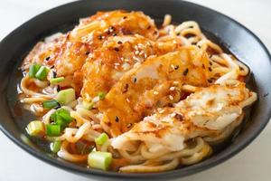Ramen noodles with gyoza or pork dumplings - Asian food style photo