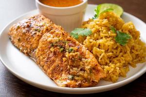 Pan-seared salmon tandoori with masala rice - Muslim food style photo