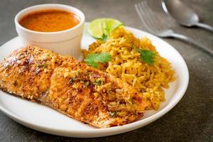 Pan-seared salmon tandoori with masala rice - Muslim food style photo