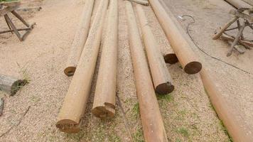Wood pole for building structure photo