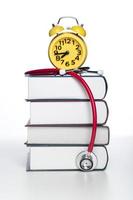 Concept of medical education with book and stethoscope photo
