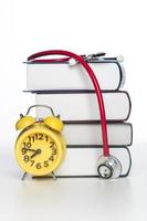 Concept of medical education with book and stethoscope photo