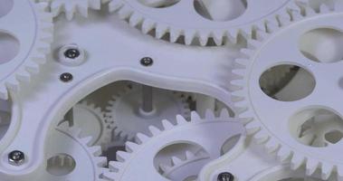 Close Up Old White Color Gears Mechanism Rotation Footage video