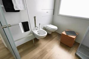 modern bathroom interoir whose floor is made of wood photo