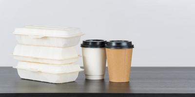 Blank paper coffee cup set with paper food containers photo