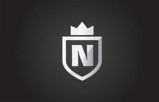 N alphabet letter logo icon in grey and black color. Shield design for company identity with king crown vector